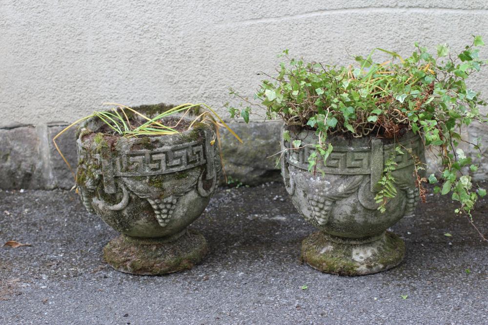 A PAIR OF COMPOSITION STONE URN PLANTERS of circular form with key banded rim Image