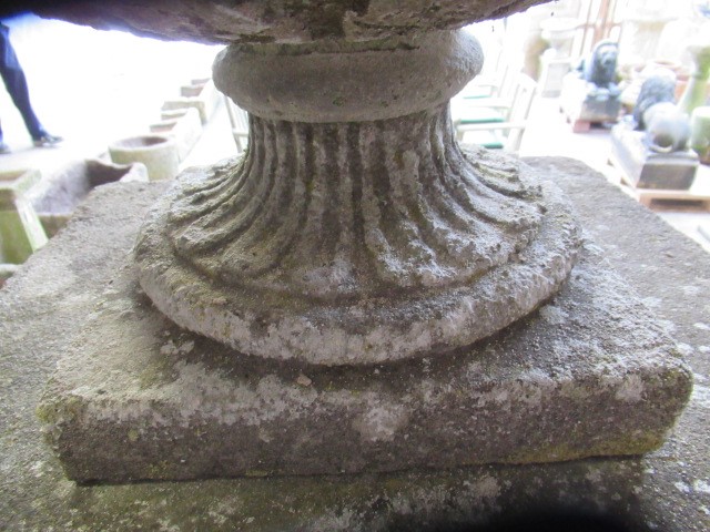 A COMPOSITION STONE LIDDED VASE Image