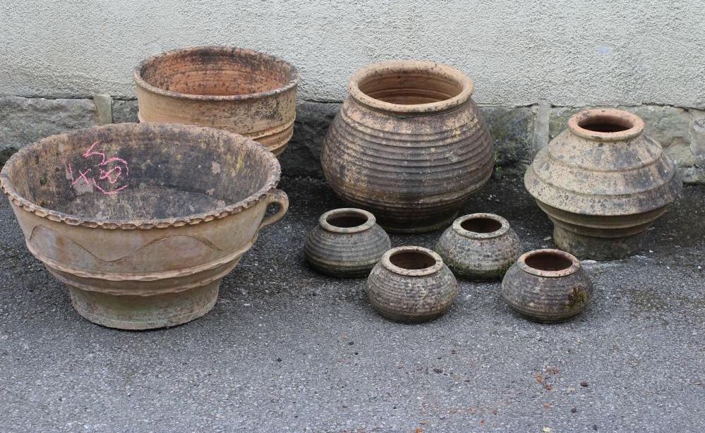 A LARGE TERRACOTTA BULB PLANTER of circular tapering form with loop handles and incised wavy line Image