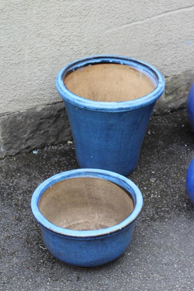 A BLUE GLAZED STONEWARE PLANTER of square tapering form with moulded rim Image