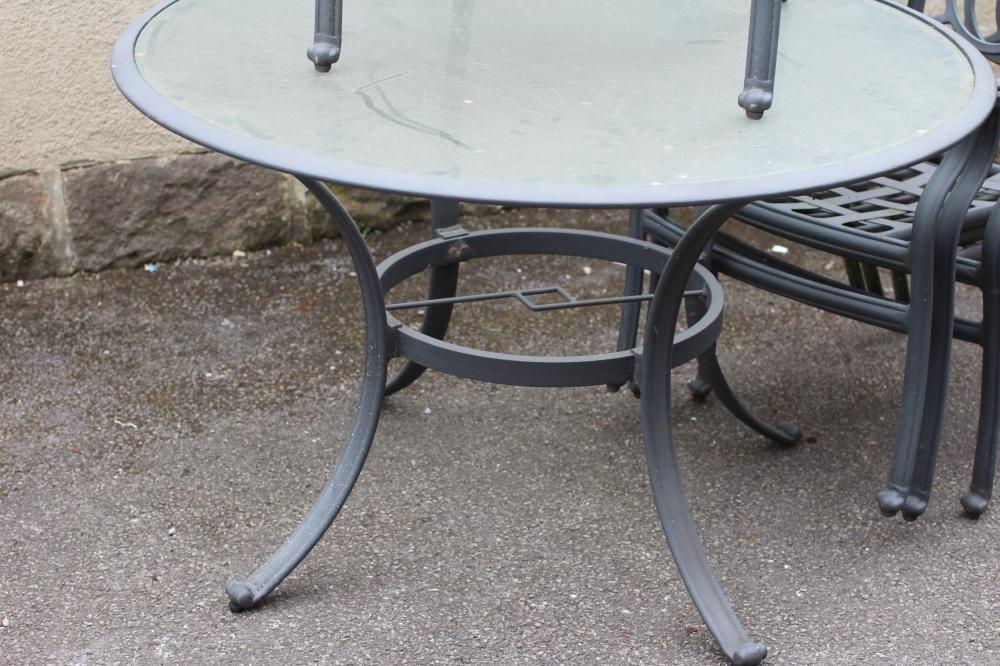 A METAL GARDEN DINING SUITE Image