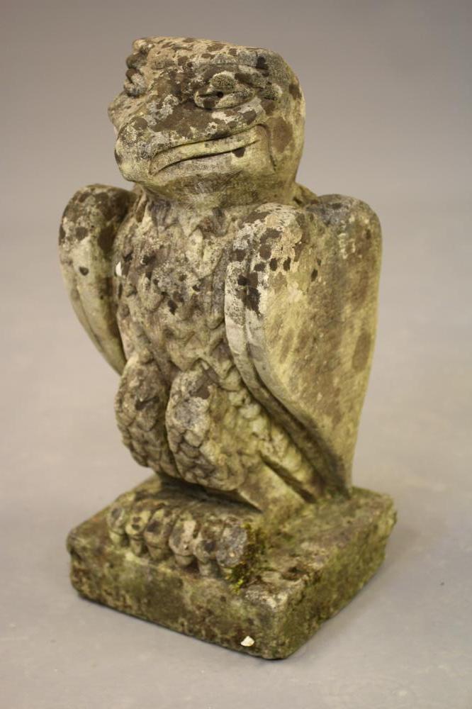 AN ARTS AND CRAFTS STYLE COMPOSITION STONE BIRD modelled standing with folded wings Image