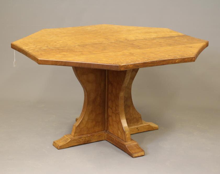 SID POLLARD OF THIRSK - an adzed oak dining table of octagonal form with mildly concave sides Image