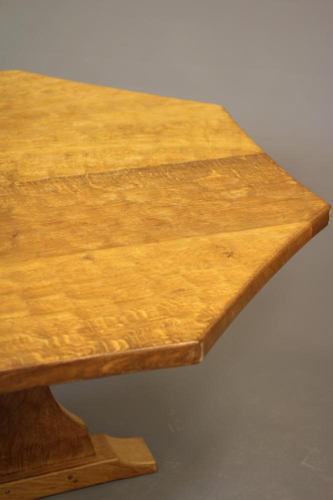 SID POLLARD OF THIRSK - an adzed oak dining table of octagonal form with mildly concave sides Image