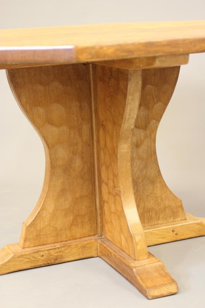 SID POLLARD OF THIRSK - an adzed oak dining table of octagonal form with mildly concave sides Image