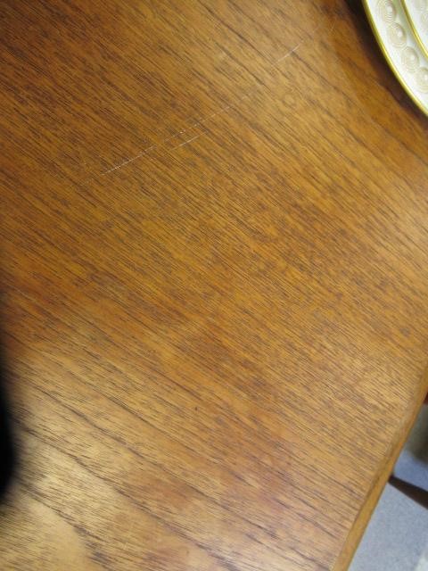 A BRAMIN TEAK DINING TABLE AND CHAIRS Image