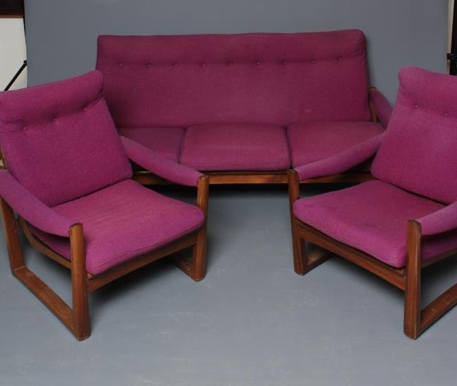 A GUY ROGERS AFROMOSIA WOOD VIRGINIA THREE PIECE LOUNGE SUITE button upholstered in a purple tweed Image