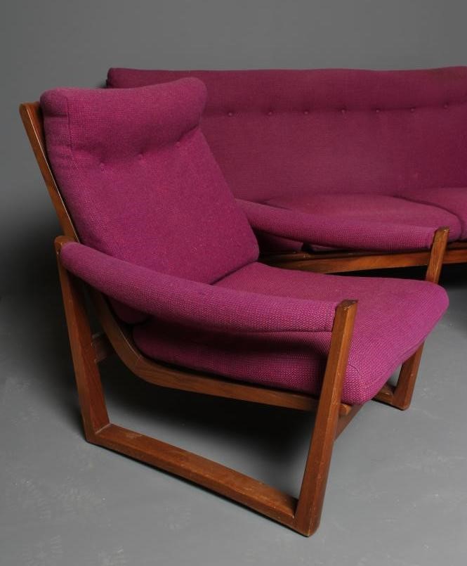 A GUY ROGERS AFROMOSIA WOOD VIRGINIA THREE PIECE LOUNGE SUITE button upholstered in a purple tweed Image