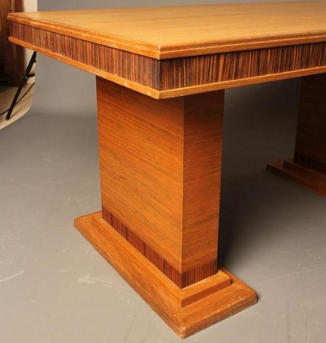 AN ART DECO TABLE veneered in American white ash and with zebra wood banding Image
