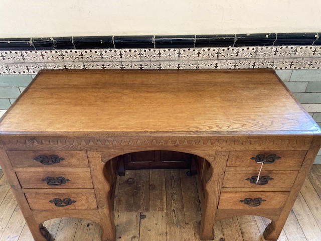 A ROBERT THOMPSON ADZED OAK PEDESTAL DESK Image