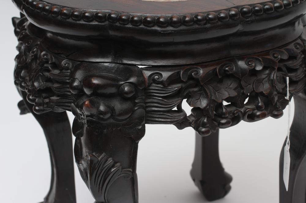 A CHINESE PADOUK WOOD JARDINIERE STAND Image