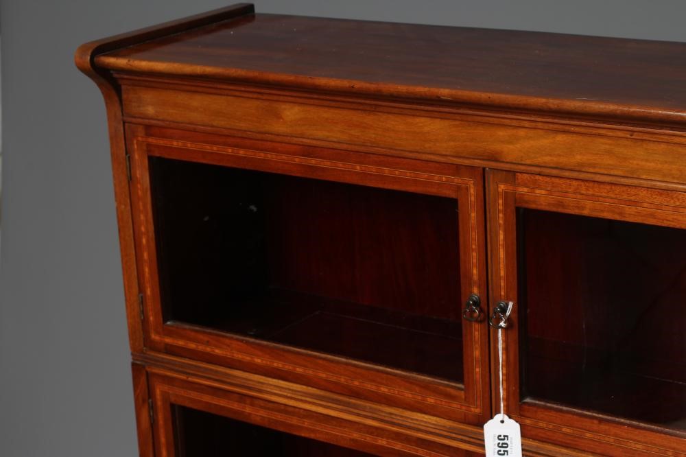 A MAHOGANY GLAZED BOOKCASE Image