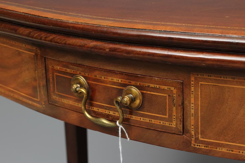 A GEORGIAN MAHOGANY SERPENTINE FOLDING CARD TABLE Image