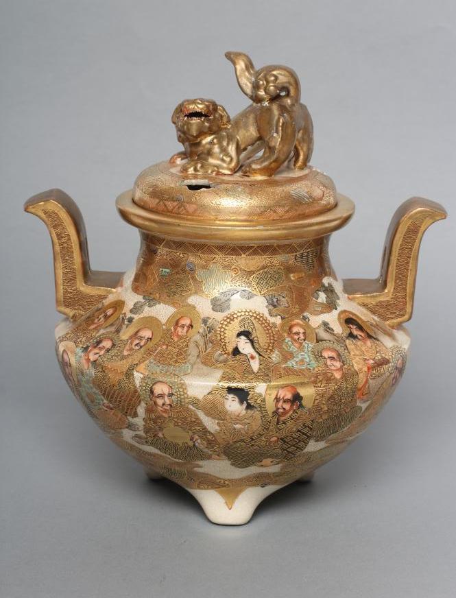 A SATSUMA EARTHENWARE KORO AND COVER of squat baluster form with two solid angular handles on four Image