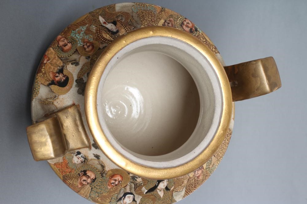 A SATSUMA EARTHENWARE KORO AND COVER of squat baluster form with two solid angular handles on four Image