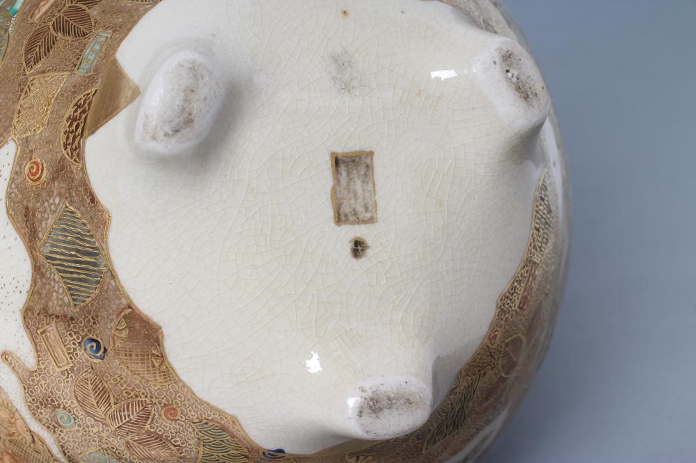 A SATSUMA EARTHENWARE KORO AND COVER of squat baluster form with two solid angular handles on four Image