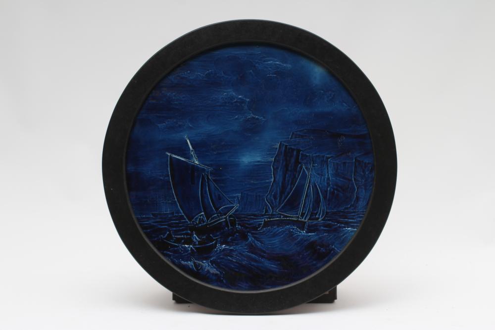 A LARGE BURMANTOFTS FAIENCE TURQUOISE GLAZED CIRCULAR PLAQUE Image