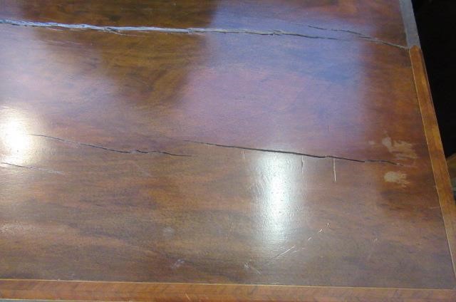 A WALNUT AND FEATHER BANDED STRAIGHT FRONTED CHEST Image