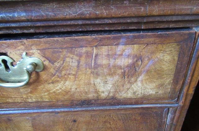 A WALNUT AND FEATHER BANDED STRAIGHT FRONTED CHEST Image