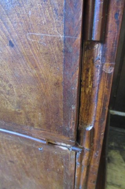 A WALNUT AND FEATHER BANDED STRAIGHT FRONTED CHEST Image