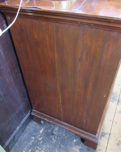 A WALNUT AND FEATHER BANDED STRAIGHT FRONTED CHEST Image