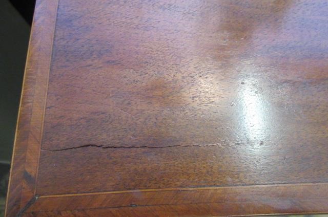 A WALNUT AND FEATHER BANDED STRAIGHT FRONTED CHEST Image