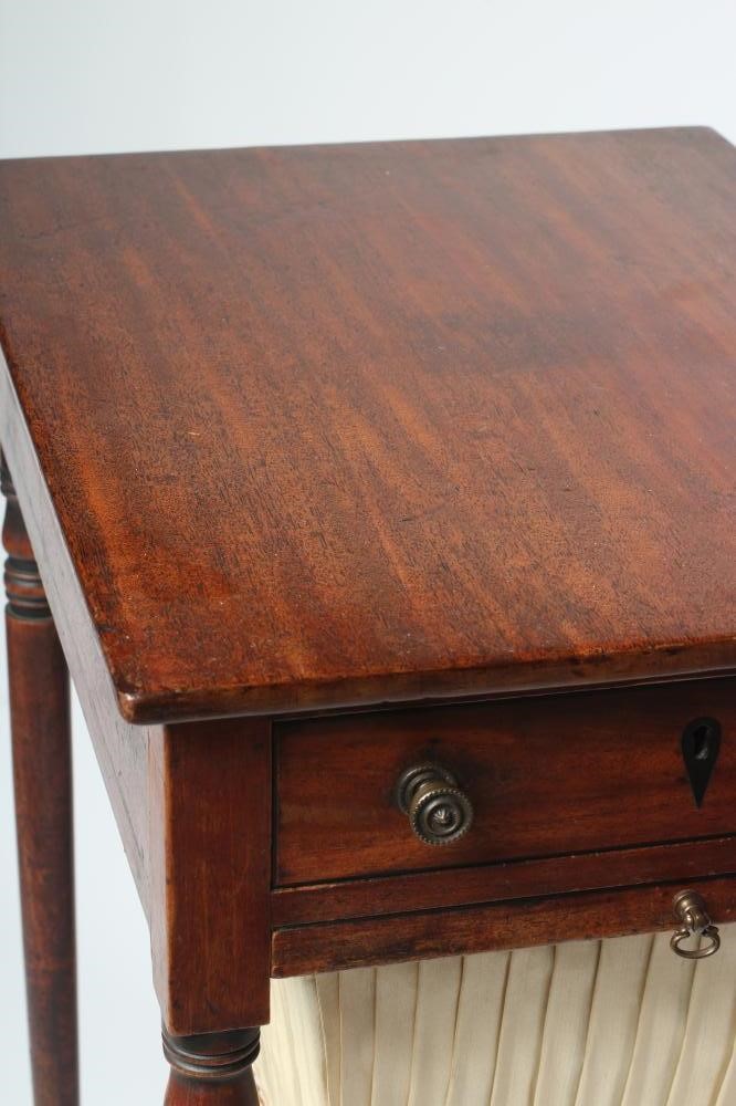 A REGENCY MAHOGANY WORK TABLE of oblong form with ebony stringing Image