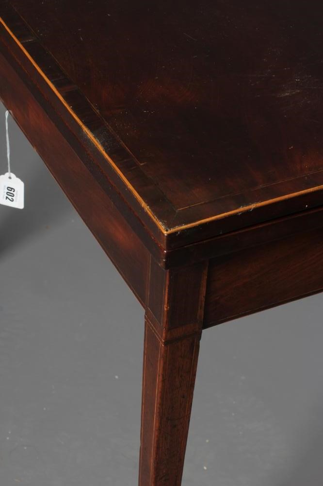 A GEORGIAN MAHOGANY FOLDING TEA TABLE Image