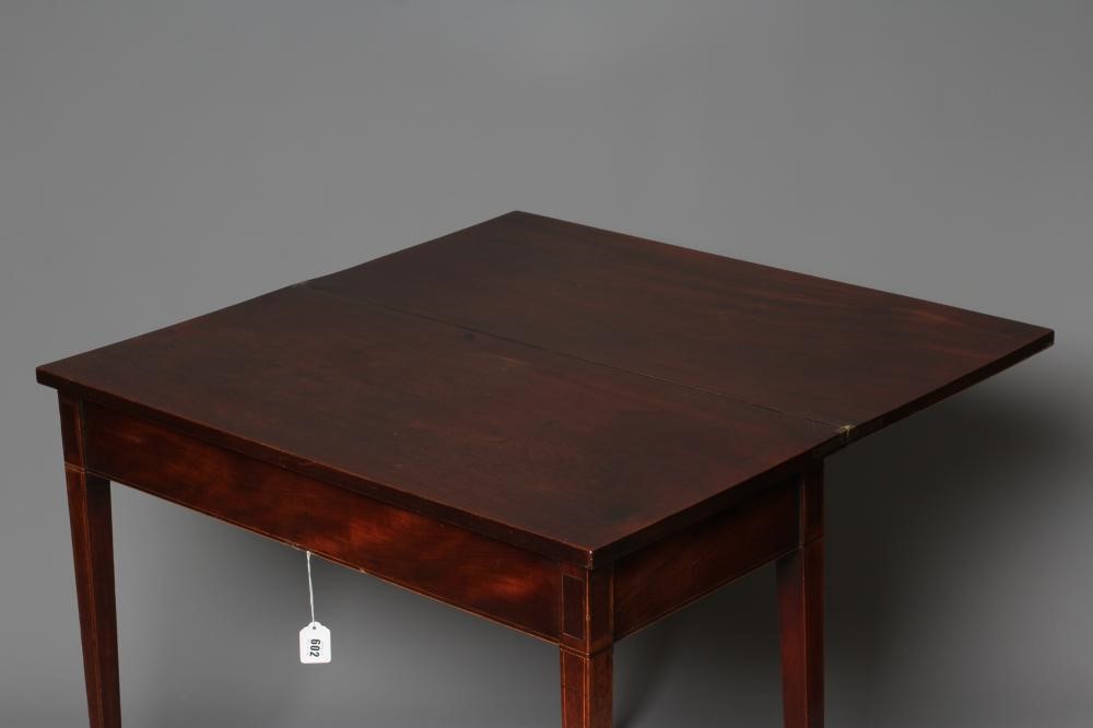 A GEORGIAN MAHOGANY FOLDING TEA TABLE Image