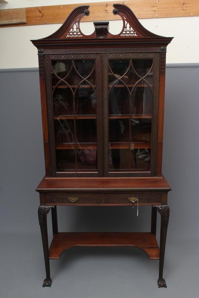 A GEORGIAN REVIVAL MAHOGANY CABINET ON STAND Image