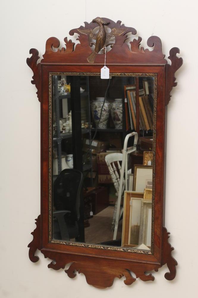 A MAHOGANY FRET FRAMED MIRROR Image