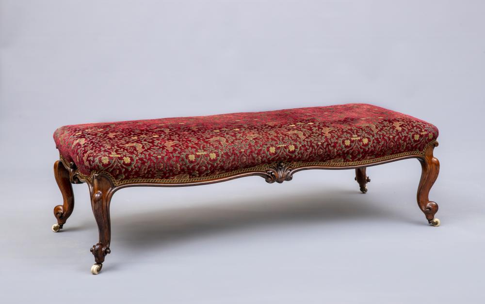 A VICTORIAN WALNUT LARGE STOOL of oblong form upholstered in red and grey cut chenille by Gisbert Image
