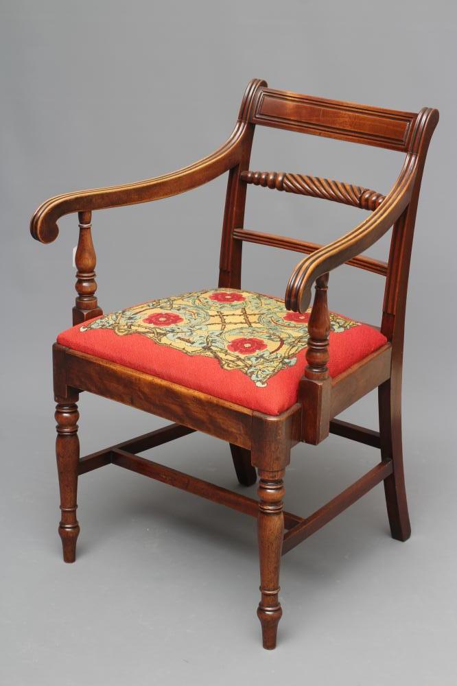 A LATE GEORGIAN MAHOGANY ELBOW CHAIR Image
