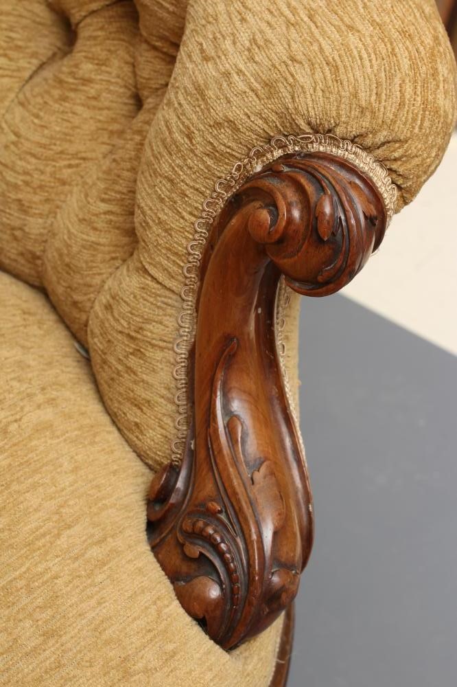 A VICTORIAN WALNUT SHOW FRAMED SOFA of serpentine form with rounded ends Image