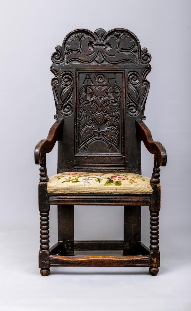 A JOINED OAK ARMCHAIR Image
