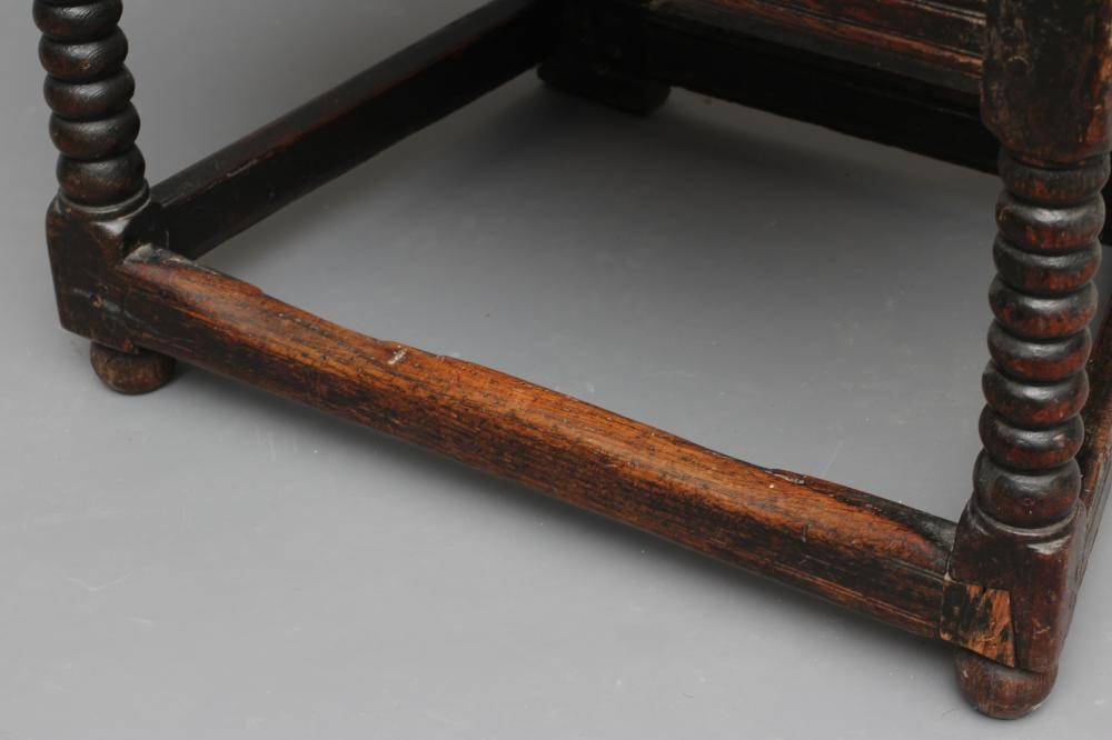 A JOINED OAK ARMCHAIR Image