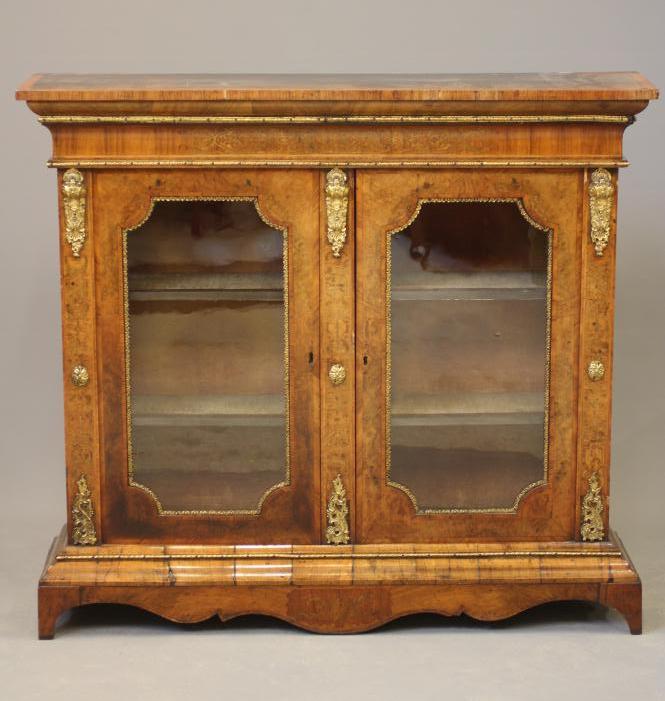 A VICTORIAN AND WALNUT MARQUETRY SIDE CABINET of oblong form crossbanded with gilt metal mounts Image
