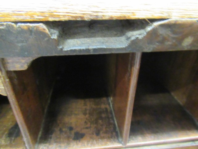 A WALNUT AND FEATHER BANDED BUREAU Image