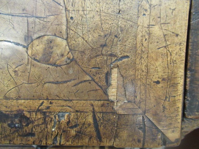 A WALNUT AND FEATHER BANDED BUREAU Image