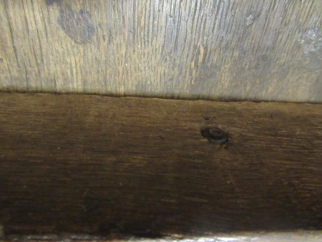 A WALNUT AND FEATHER BANDED BUREAU Image