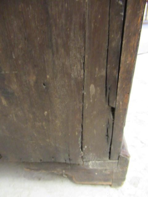 A WALNUT AND FEATHER BANDED BUREAU Image