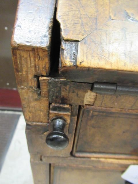 A WALNUT AND FEATHER BANDED BUREAU Image