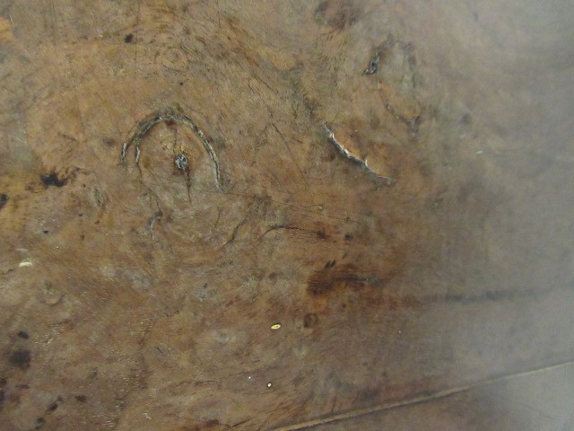 A WALNUT AND FEATHER BANDED BUREAU Image