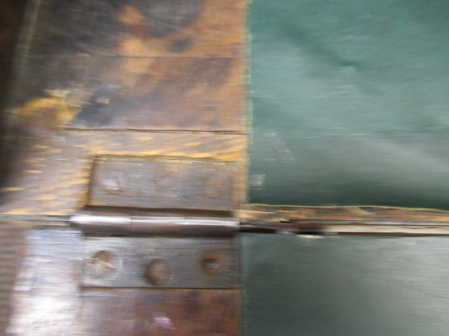 A WALNUT AND FEATHER BANDED BUREAU Image