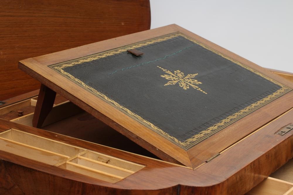 A VICTORIAN WALNUT AND MARQUETRY WORK TABLE of oblong form with rounded ends Image