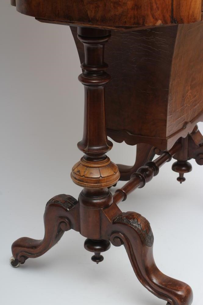 A VICTORIAN WALNUT AND MARQUETRY WORK TABLE of oblong form with rounded ends Image