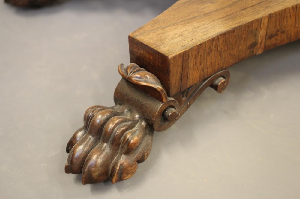 A LATE GEORGIAN ROSEWOOD FOLDING CARD TABLE of rounded oblong form Image