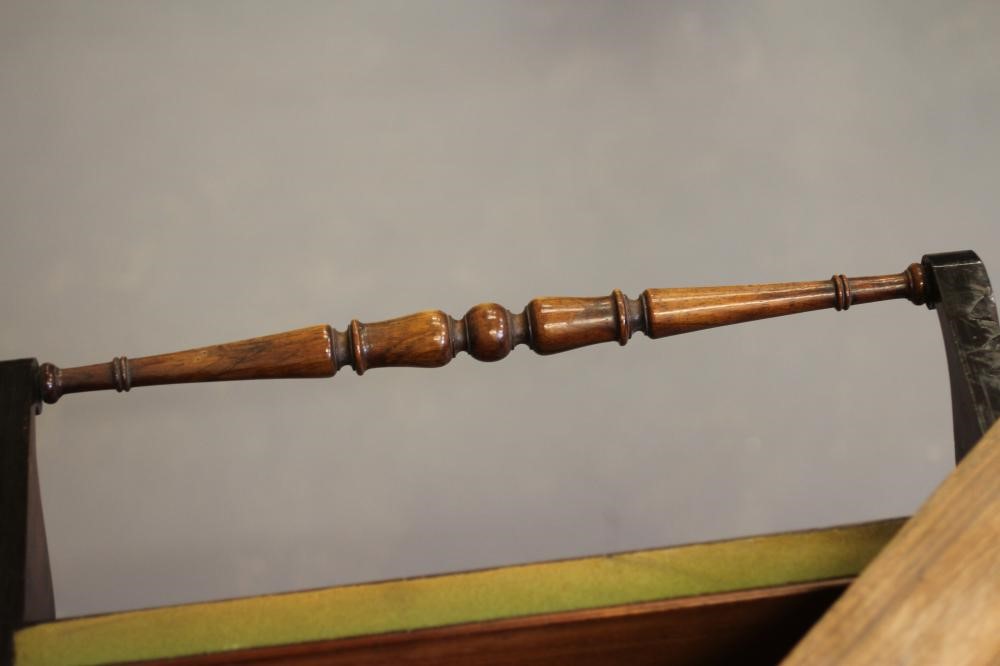 A LATE GEORGIAN ROSEWOOD FOLDING CARD TABLE of rounded oblong form Image