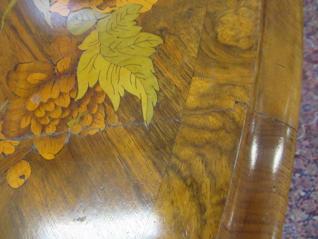 A VICTORIAN WALNUT AND FLORAL MARQUETRY CENTRE TABLE Image