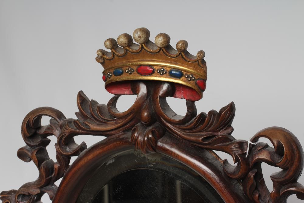 A MAHOGANY FRAMED WALL MIRROR Image